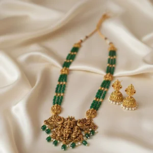 exquisite emerald green temple jewelry set with nakshi pendant & jhumkas | ka treasure hub